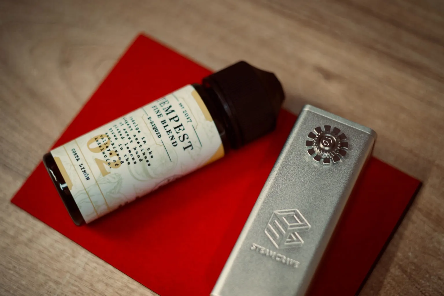 Flacons de e-liquide de différents dosages alignés sur une table